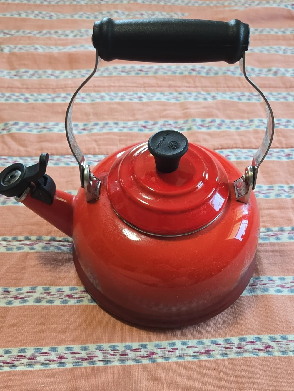 Le Creuset Red Enamel Classic Whistling Tea Kettle with Black Handle
